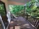 Outdoor deck area with room for seating and view of backyard and trees at 3054 Whisper Knob Rd, Marietta, GA 30062