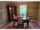 Dining room with hardwood floors, a chandelier, and a window at 3054 Whisper Knob Rd, Marietta, GA 30062