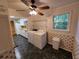 View of laundry room with washer, dryer, and access to the kitchen in background at 3054 Whisper Knob Rd, Marietta, GA 30062