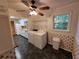 Convenient laundry area featuring a washer, dryer, and storage shelving at 3054 Whisper Knob Rd, Marietta, GA 30062