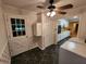 View of laundry room with exit door, washer, dryer, and access to kitchen in background at 3054 Whisper Knob Rd, Marietta, GA 30062