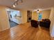 Open-concept living room featuring a stone fireplace and hardwood floors at 3054 Whisper Knob Rd, Marietta, GA 30062