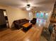 Cozy living room with a stone fireplace and hardwood floors at 3054 Whisper Knob Rd, Marietta, GA 30062