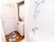 Bathroom features a tub/shower combination and in-unit laundry at 307 Little Hickory Ln, Woodstock, GA 30189