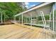 Covered boat dock on the water with swimming ladder and bridge at 307 Little Hickory Ln, Woodstock, GA 30189