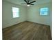This room features laminate flooring, neutral colored walls and two windows for natural light at 705 Stewart Nw Cir, Marietta, GA 30064
