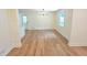 Open dining room space featuring hardwood floors and a view of the yard at 705 Stewart Nw Cir, Marietta, GA 30064