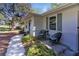Inviting home exterior with cozy front porch seating and lush landscaping at 705 Stewart Nw Cir, Marietta, GA 30064
