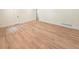 Spacious living room featuring hardwood flooring, freshly painted walls, and ample room for furnishings at 705 Stewart Nw Cir, Marietta, GA 30064