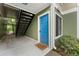 Welcoming entryway with a bright blue door and a 'Stay Awhile' doormat at 1274 Branch Dr, Tucker, GA 30084