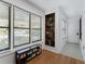 Bright entryway with ample windows, built-in shelving, and a convenient shoe rack at 1274 Branch Dr, Tucker, GA 30084