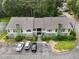 Two-story condo with a light green and beige color scheme, and three parking spots at 1274 Branch Dr, Tucker, GA 30084