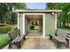 Community mailboxes are housed in a covered structure with benches and exterior lighting at 1274 Branch Dr, Tucker, GA 30084