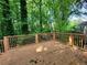 Large deck providing views of the surrounding trees, offering a private outdoor living space for relaxation at 180 Preston Oaks Dr, Johns Creek, GA 30022