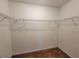 Spacious walk-in closet featuring a wire shelving system for optimal organization and storage solutions at 180 Preston Oaks Dr, Johns Creek, GA 30022