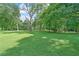 Expansive green space featuring manicured lawns and mature trees, perfect for outdoor activities at 22 The Prado Ne, Atlanta, GA 30309