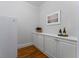 Pantry with white cabinetry, countertops, and hardwood floors at 22 The Prado Ne, Atlanta, GA 30309