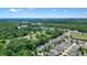 Wide aerial view showcasing the community and surrounding greenery at 400 Pringle Dr, Suwanee, GA 30024