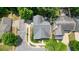 Aerial view of home showcasing roof and landscaping in a cul-de-sac at 400 Pringle Dr, Suwanee, GA 30024