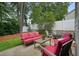Backyard patio showcasing comfortable outdoor seating and a fire pit at 400 Pringle Dr, Suwanee, GA 30024
