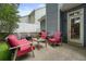 Backyard patio seating with outdoor furniture and fire pit at 400 Pringle Dr, Suwanee, GA 30024