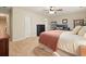 Comfortable bedroom with work space, soft rug, and comfortable bed at 400 Pringle Dr, Suwanee, GA 30024