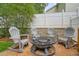Relaxing fire pit area with comfortable Adirondack chairs at 400 Pringle Dr, Suwanee, GA 30024