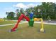 Unique, colorful statue graces the community green space, adding character to the neighborhood at 400 Pringle Dr, Suwanee, GA 30024