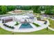 A town center with a striking water feature, an amphitheater, and landscaped areas at 400 Pringle Dr, Suwanee, GA 30024
