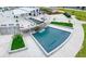 Unique water feature surrounded by lush greenery and inviting seating areas at 400 Pringle Dr, Suwanee, GA 30024