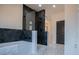 Modern bathroom showcasing a soaking tub and a walk-in shower at 90 Ayers Rd, Bowdon, GA 30108
