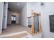 Hallway features plush carpeting, natural wood railing with modern iron spindles and an open concept at 90 Ayers Rd, Bowdon, GA 30108