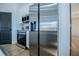 The kitchen offers stainless steel appliances, white cabinets, and modern design at 90 Ayers Rd, Bowdon, GA 30108