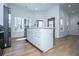 Charming kitchen island features stainless appliances, plenty of storage, and a modern faucet at 90 Ayers Rd, Bowdon, GA 30108