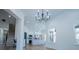 Bright kitchen with white cabinetry, stainless steel appliances, and hardwood floors at 90 Ayers Rd, Bowdon, GA 30108