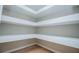 Pantry with wrap around shelving and hardwood floors at 90 Ayers Rd, Bowdon, GA 30108