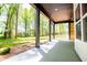 Covered patio with ceiling fan offering a relaxing transition between indoor and outdoor spaces at 90 Ayers Rd, Bowdon, GA 30108