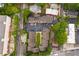 High aerial view of the townhome community including layout, parking, and proximity to commerce at 1516 Howell Mill Nw Rd # 16, Atlanta, GA 30318