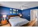 This bedroom is well-lit and has a queen size bed with side tables and lamps at 1516 Howell Mill Nw Rd # 16, Atlanta, GA 30318