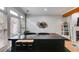 Dining area with natural light and bar with coffee, tea, and sugar containers at 1516 Howell Mill Nw Rd # 16, Atlanta, GA 30318