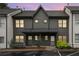 Charming townhome showcasing a newly painted exterior and well-maintained landscaping at 1516 Howell Mill Nw Rd # 16, Atlanta, GA 30318