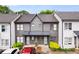 Two-story townhome featuring a modern design with gray and white color palette at 1516 Howell Mill Nw Rd # 16, Atlanta, GA 30318