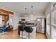 An open kitchen area with stainless steel appliances and counter seating at 1516 Howell Mill Nw Rd # 16, Atlanta, GA 30318