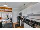 Modern kitchen features stainless steel appliances and granite countertops at 1516 Howell Mill Nw Rd # 16, Atlanta, GA 30318