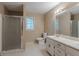Bathroom with shower stall, toilet and sink with vanity at 1744 Cum Laude Way, Lawrenceville, GA 30044