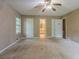 Bedroom shows a window, and two doors, one leading to a bathroom at 1744 Cum Laude Way, Lawrenceville, GA 30044