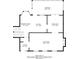 Black and white floor plan of the first floor highlighting living room and kitchen dimensions at 1744 Cum Laude Way, Lawrenceville, GA 30044
