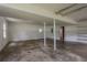 Large garage space with painted walls, concrete floor, shelving, and a window at 1744 Cum Laude Way, Lawrenceville, GA 30044