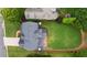 An aerial view shows the property's expansive yard, mature trees, and location within a residential neighborhood at 1860 Leighton Ln, Marietta, GA 30062