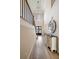 Entry hall showcases hardwood floors, high ceilings, decorative mirror, and a staircase, creating an inviting and elegant entry at 1860 Leighton Ln, Marietta, GA 30062